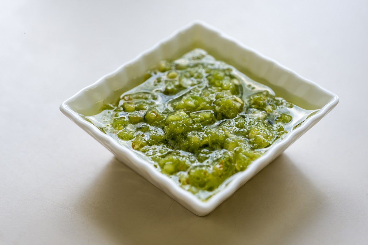 Green Chilli Thecha Recipe made with green chillies spices garlic for