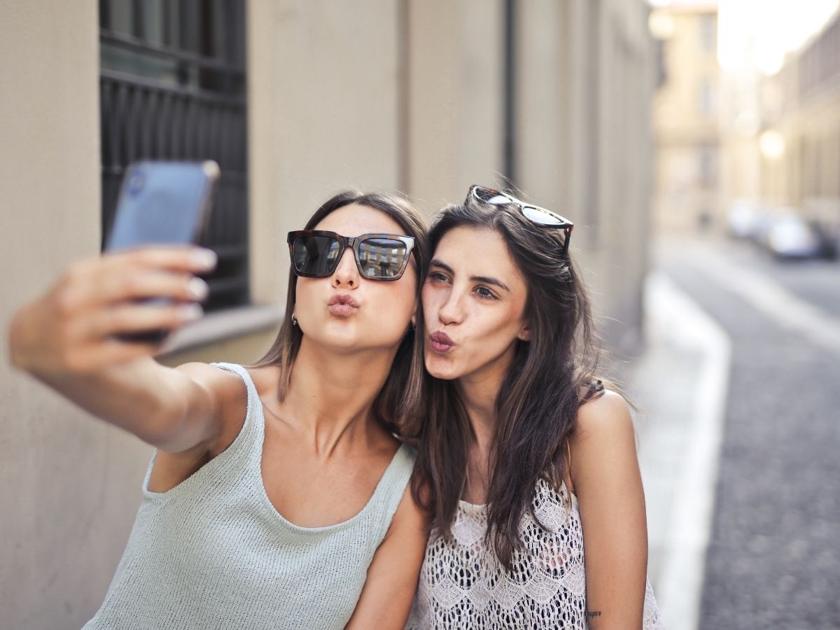 Group of Best multiracial Friends Taking a Selfie Outdoor at the City. Thre  Couples Having Fun Together, Making Photo for Memory with Funny Pose, Happy  Friendship grimace lifestyle Concept Stock Photo |